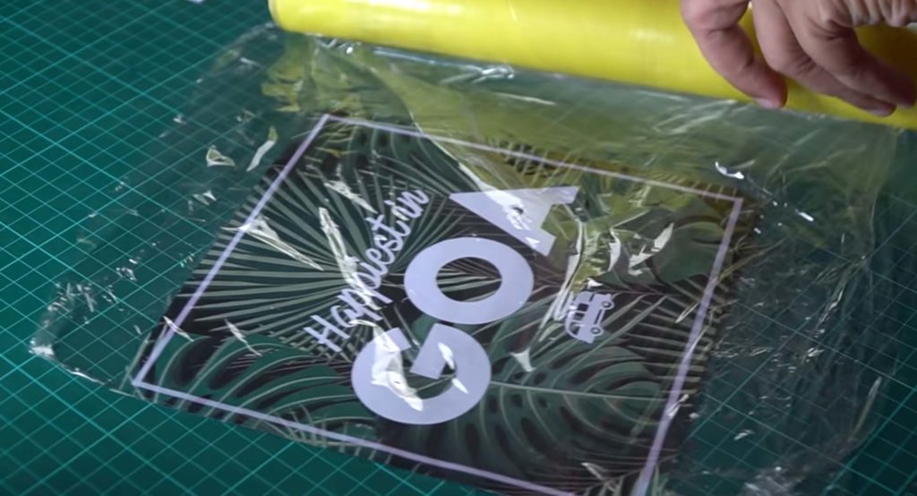You use food wrap to carefully wrap the print - how to print a shirt